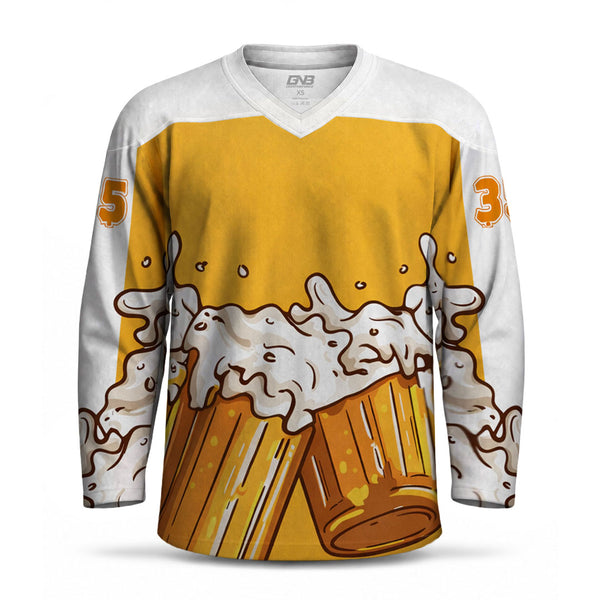 A long-sleeve V-neck hockey jersey with a yellow and white body, printed with an illustration of two foaming beer mugs across the front. Orange numbers are visible on the sleeves.