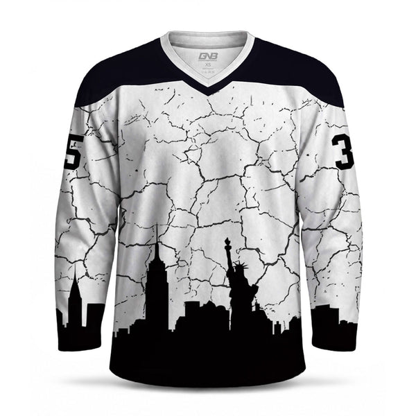 A long-sleeve hockey jersey with a black and white lighting design, a black New York city skyline silhouette across the bottom, and large black numbers on the sleeves.