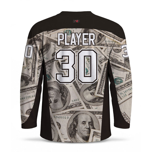 A long-sleeve hockey-style jersey shown from the back, featuring a black collar, shoulders, and sleeves, with a back panel and sleeves printed with a collage of U.S. personalized name and large number in white with black outline.