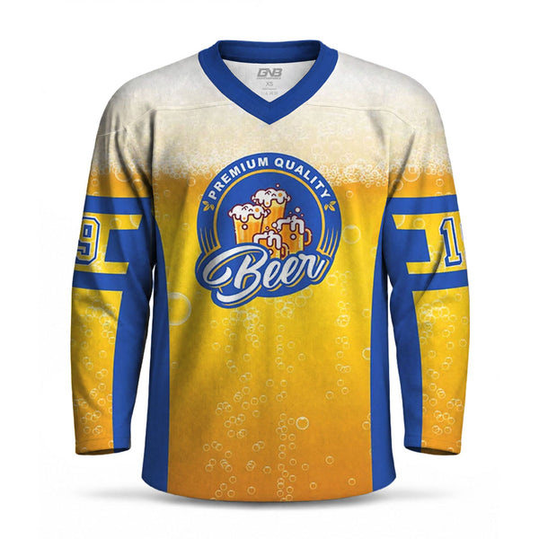 A long-sleeve hockey jersey with a beer-themed graphic. The shirt has a white-to-yellow beer-bubble gradient, blue V-neck collar and sleeve trim, and a large front crest reading 'PREMIUM QUALITY Beer' with beer glasses and foam.
